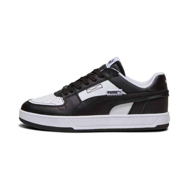 Puma nere con outlet gomma bianca